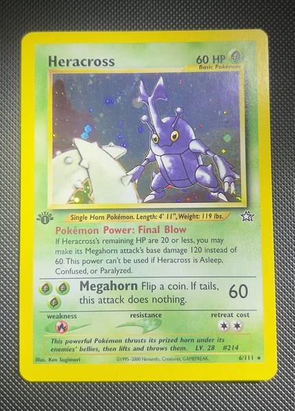 Heracross, Neo Genesis 1st Edition 6/111, front view showing holo surface and edges